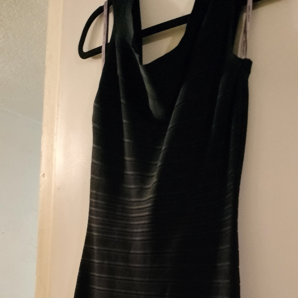 Little black dress with zipper in back never worn size M